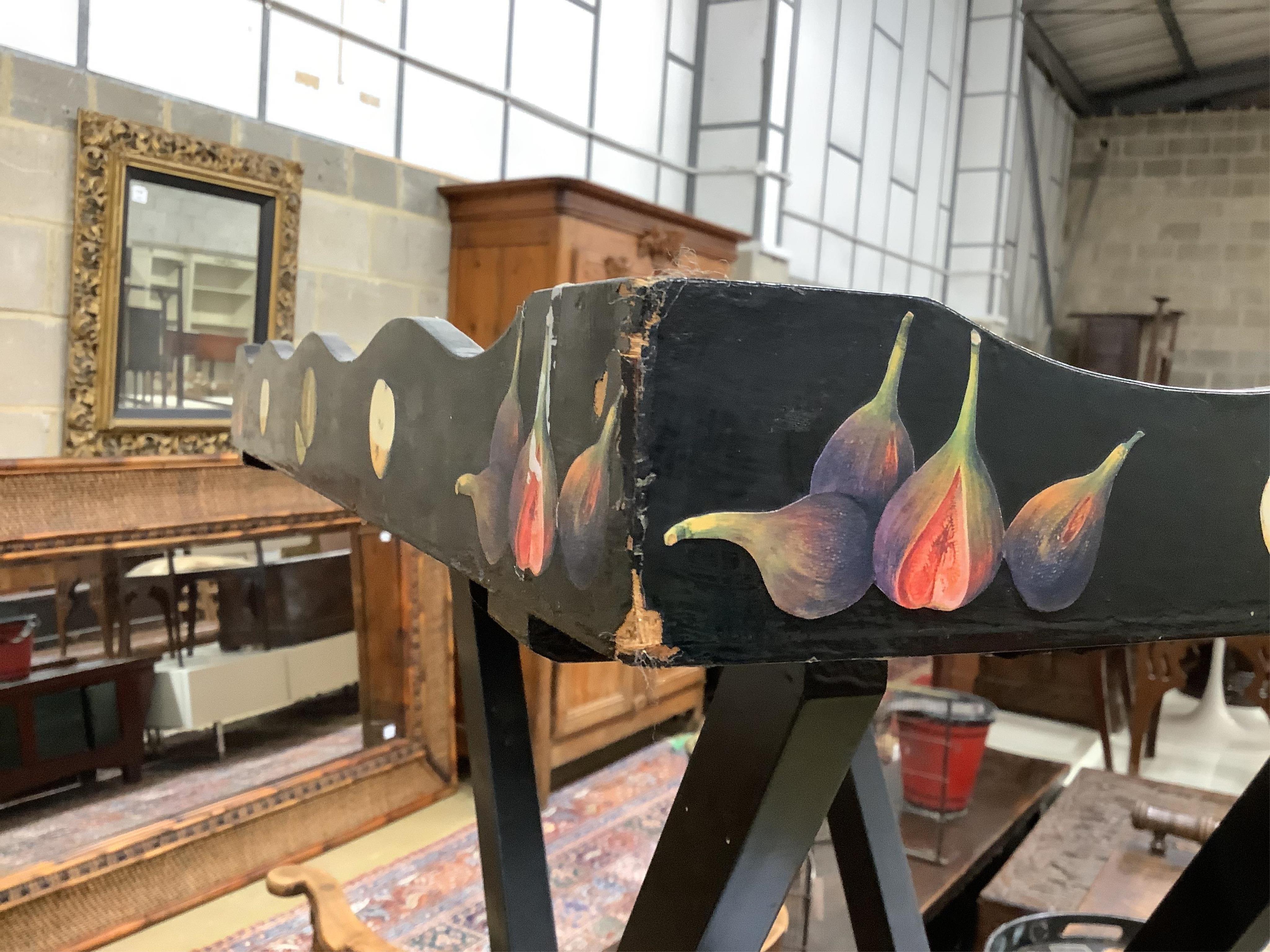 Julia Black, a decoupage butler's tray on folding stand, width 58cm, height 78cm, together with a circular tray. Condition - fair